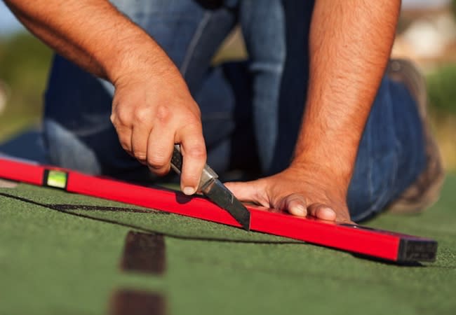 Installing a New Roof - Cutting Shingles