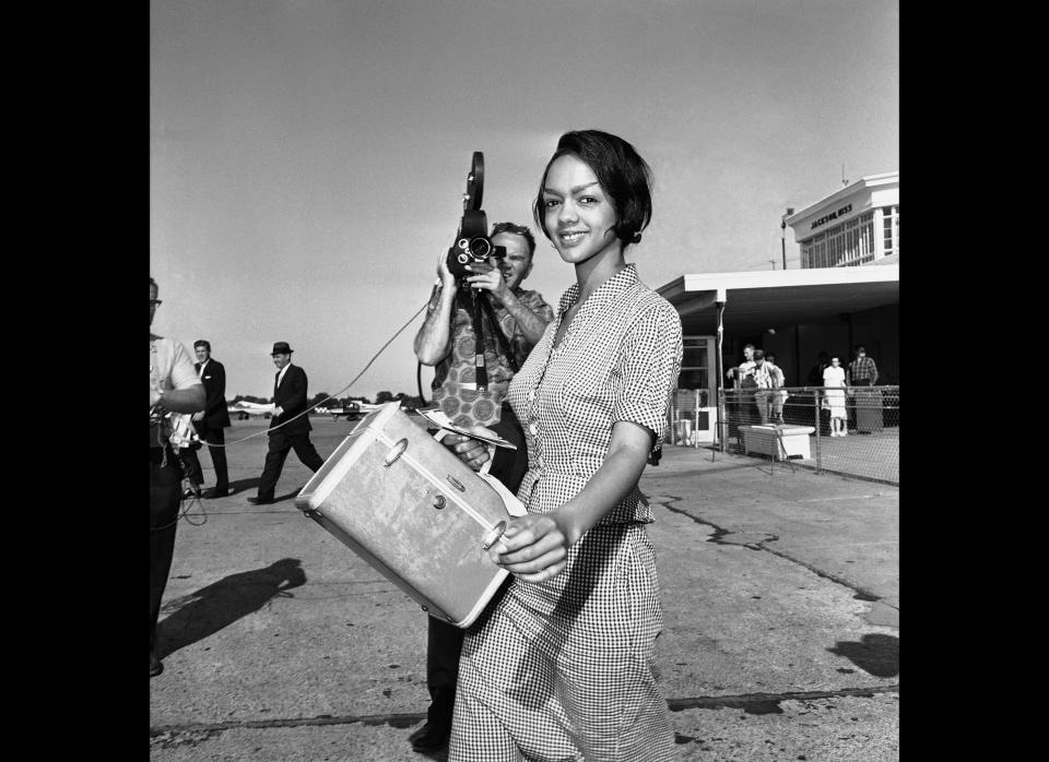 Lucretia Collins, 21, "Freedom Rider" from Fairbanks, Alaska, walks to plane in Jackson, May 27, 1961, after being freed from the county jail on $500 bond. (AP)