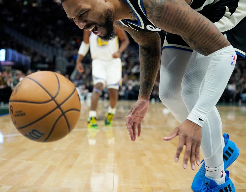 Milwaukee Bucks guard Damian Lillard (0) loses control of the ball during the second half of the game against the Golden State Warriors on Saturday January 13, 2024 at the Fiserv Forum in Milwaukee, Wis.