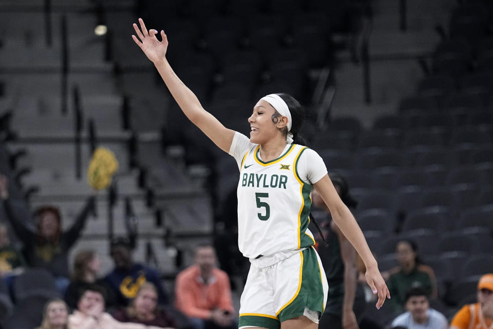 Baylor guard Darianna Littlepage-Buggs (5) celebrates after a score against Miami during the first half of an NCAA college basketball game in San Antonio, Saturday, Dec. 16, 2023. (AP Photo/Eric Gay)