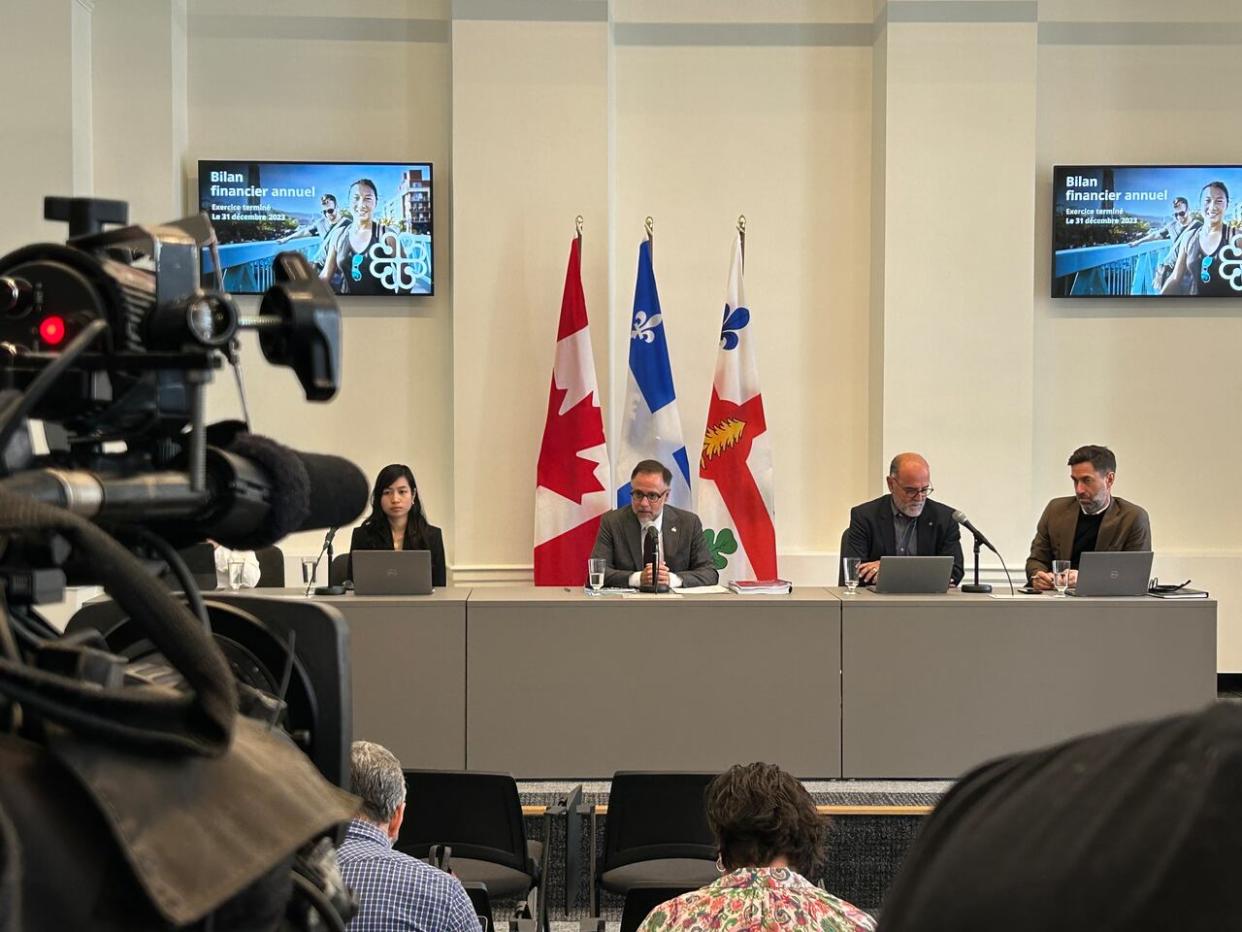 Montreal director general Serge Lamontagne, second from right, said the city was essentially two snowstorms away from a very different result in its financial review, given that each storm usually costs the city around $20 million.  (Rowan Kennedy/CBC - image credit)