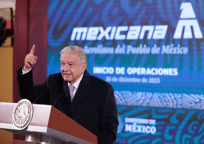 Mexico President Andres Manuel Lopez Obrador gestures during a news conference as his government re-launched former state airline Mexicana de Aviacion, in Mexico City