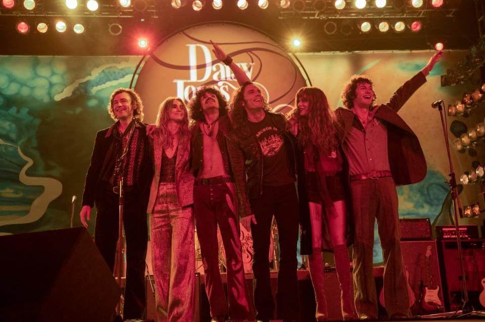 The fictional band of "Daisy Jones & the Six": Josh Whitehouse as Eddie Roundtree (bass), Suki Waterhouse as Karen Sirko (keyboard), Sebastian Chacon as Warren Rojas (drums), Sam Claflin as Billy Dunne (guitar and vocals), Riley Keough as Daisy Jones (vocals) and Will Harrison as Graham Dunne (bass).