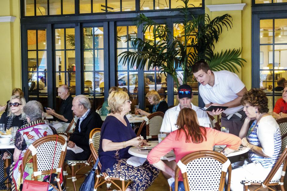 West Palm Beach, CityPlace, Brio Tuscan Grille outdoor tables. (Photo by: Jeffrey Greenberg/Universal Images Group via Getty Images)