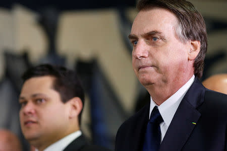 Brazil's President Jair Bolsonaro arrives for a meeting to deliver the pension reform bill proposal at the National Congress, in Brasilia, Brazil February 20, 2019. REUTERS/Adriano Machado