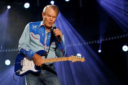 American country music artist Glen Campbell performs during the Country Music Association (CMA) Music Festival in Nashville, Tennessee June 7, 2012. REUTERS/Harrison McClary/File Photo