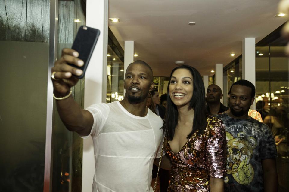 Jamie Foxx takes a selfie with daughter Corinne Foxx at LAVO Singapore. (Photo: TAO Group)