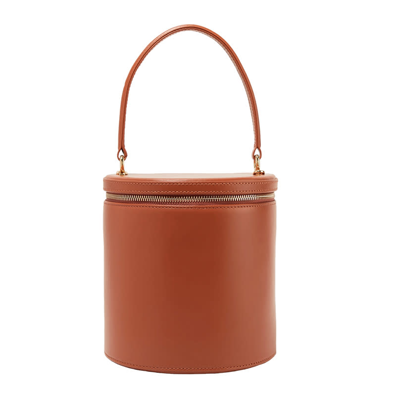 <a rel="nofollow noopener" href="https://rstyle.me/n/cydxafchdw" target="_blank" data-ylk="slk:Vitti Leather Tote in Saddle, Staud, $475Similar to the Bissett, the Vitti features a structured top handle. but with a sleek zippered top.;elm:context_link;itc:0;sec:content-canvas" class="link ">Vitti Leather Tote in Saddle, Staud, $475<p>Similar to the Bissett, the Vitti features a structured top handle. but with a sleek zippered top.</p> </a><p> <strong>Related Articles</strong> <ul> <li><a rel="nofollow noopener" href="http://thezoereport.com/fashion/style-tips/box-of-style-ways-to-wear-cape-trend/?utm_source=yahoo&utm_medium=syndication" target="_blank" data-ylk="slk:The Key Styling Piece Your Wardrobe Needs;elm:context_link;itc:0;sec:content-canvas" class="link ">The Key Styling Piece Your Wardrobe Needs</a></li><li><a rel="nofollow noopener" href="http://thezoereport.com/living/work/one-thing-every-day-two-weeks-better-career/?utm_source=yahoo&utm_medium=syndication" target="_blank" data-ylk="slk:I Did One Thing Every Day for Two Weeks to Better My Career;elm:context_link;itc:0;sec:content-canvas" class="link ">I Did One Thing Every Day for Two Weeks to Better My Career</a></li><li><a rel="nofollow noopener" href="http://thezoereport.com/living/relationships/discuss-money-significant/?utm_source=yahoo&utm_medium=syndication" target="_blank" data-ylk="slk:How To Discuss Money With Your Significant Other;elm:context_link;itc:0;sec:content-canvas" class="link ">How To Discuss Money With Your Significant Other</a></li> </ul> </p>