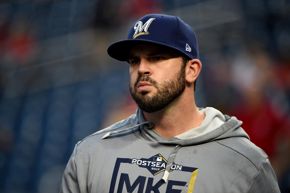 Mike Moustakas #11 of the Milwaukee Brewers looks on during batting practice prior to the National League Wild Card game against the Washington Nationals at Nationals Park on October 01, 2019 in Washington, DC. (Photo by Will Newton/Getty Images)