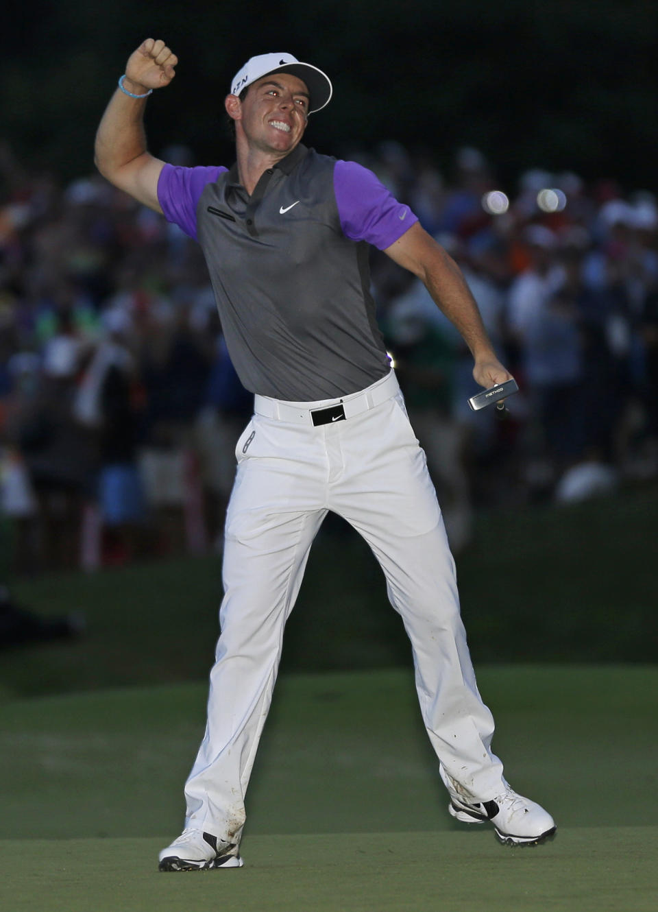 Rory McIlroy, of Northern Ireland, celebrates after winning the PGA Championship golf tournament at Valhalla Golf Club on Aug. 10, 2014, in Louisville, Ky. McIlroy has not won another major championship since then. The PGA returns to Valhalla on May 16-19, 2024. (AP Photo/David J. Phillip, File)