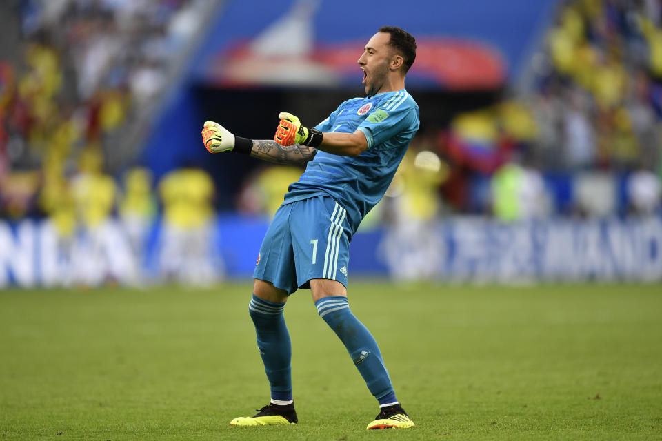 <p>Colombia goalkeeper David Ospina celebrates after teammate Yerry Mina scored the opening goal </p>