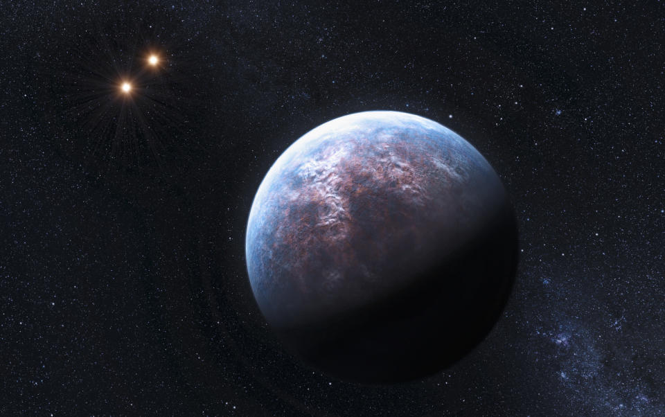 An artist's rendering image released to Reuters on October 19, 2009 shows an exoplanet 6 times the Earth-size circulating around its low-mass host star at a distance equal to 1/20th of the Earth-Sun distance. The host star is a companion to two other low-mass stars, which are seen here in the distance (L). European astronomers announced they had found 32 new planets orbiting stars outside our solar system and said on Monday they believe their find means that 40 percent or more of Sun-like stars have such planets. REUTERS/ESO/L. Calcada/Handout