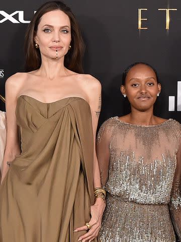 <p>Axelle/Bauer-Griffin/FilmMagic</p> Angelina Jolie and Zahara Jolie-Pitt attend the Los Angeles Premiere of Marvel Studios' "Eternals" on October 18, 2021.