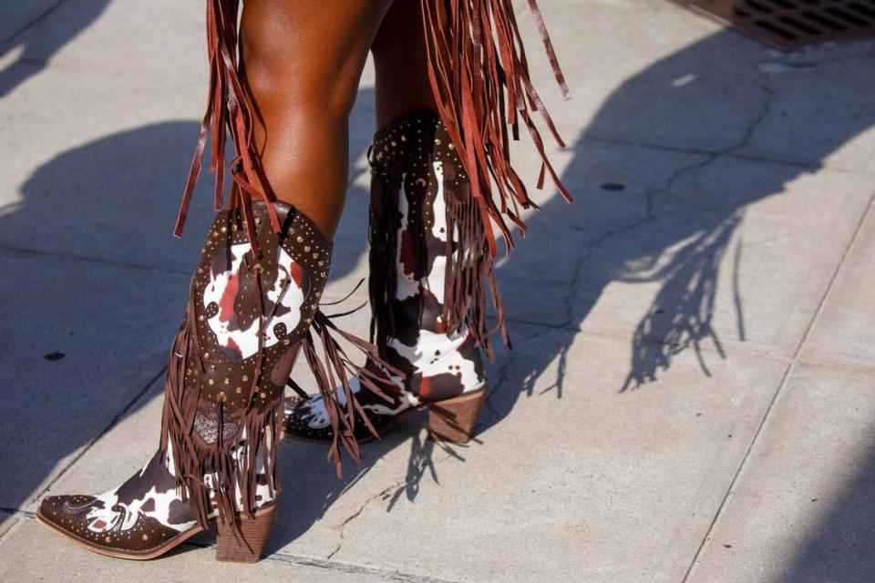 Country music fans arrive for the first night Carolina Country Music Fest 2024. The four day event is expected to draw 30,000 each night at the Burroughs and Chapin Pavilion Place in Myrtle Beach, S.C. Thursday, June 6, 2024.