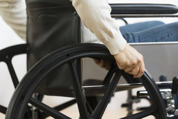 USA,  New Jersey, Jersey City, Man on wheelchair