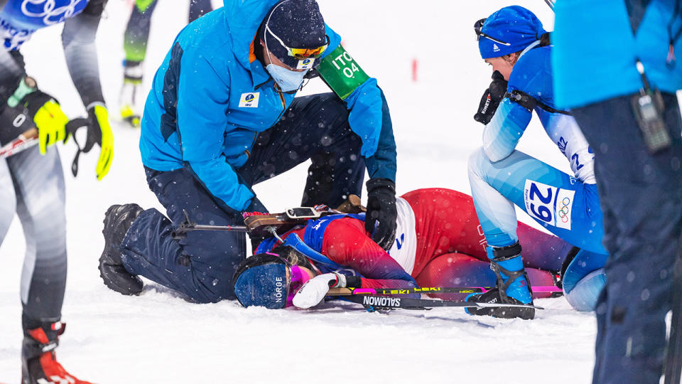 Ingrid Landmark Tandrevold, pictured here after collapsing at the finish line of the women's biathlon pursuit at the Winter Olympics.