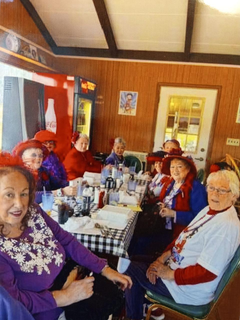 The Bette Boop Babes Chapter of the Red Hat Society had lunch recently to welcome the new owner of the former Cherry Ridge Airport Restaurant outside Honesdale, now known as the Betty Boops Airport Cafe. From left are members Marianne Vassallo, Vice Queen Judy Maneval, Karen Vasella, Carol MacLean, Lee DeKorte, Arlene Battista, Queen Mother Dee Cullen and Treasurer Karen McGhee.