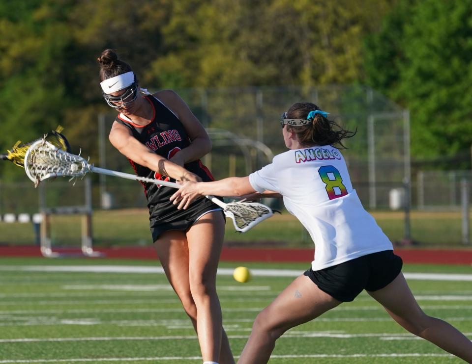 Pawling's Sadie Manger (28) in action against Arlington during girls lacrosse action at Arlington High School in LaGrangeville on Saturday, May 6, 2023. 