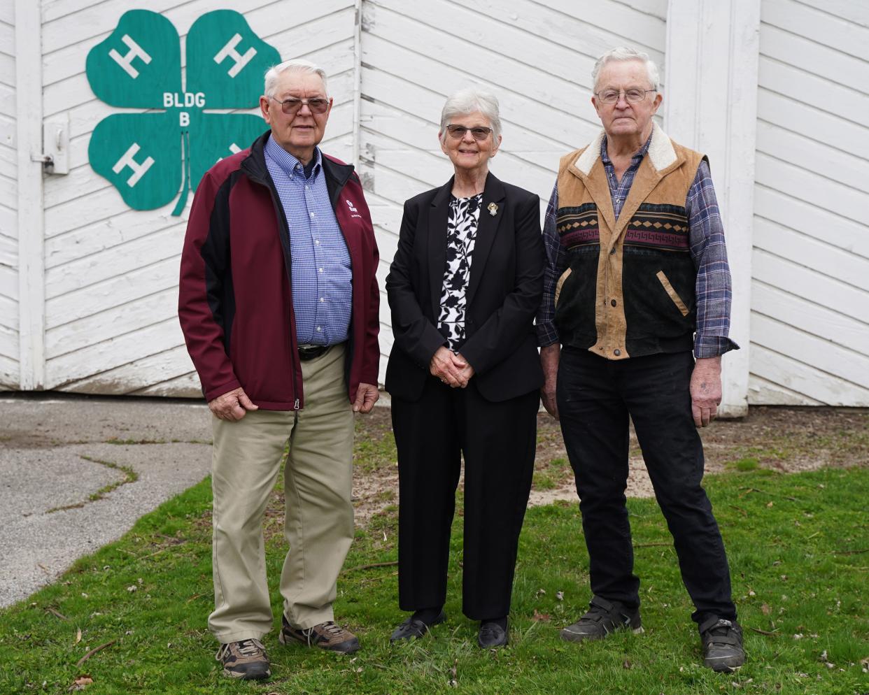 From left, Larry and Joan Gould and Dr. Howard Pennington are pictured April 22 at the Lenawee County Fair & Event Grounds. Each of them has dedicated well over 50 years to 4-H as volunteers and participants.