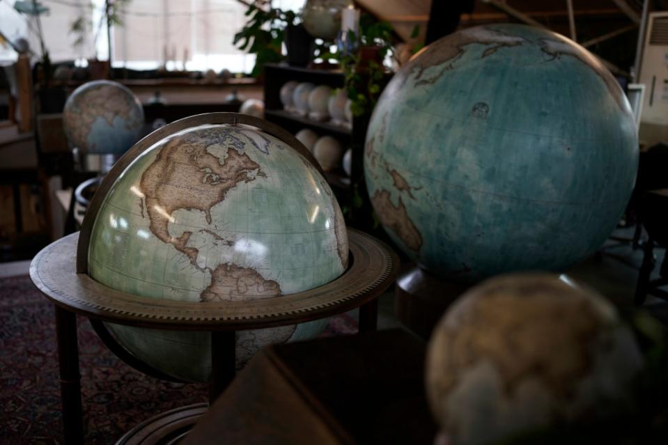 Despite Google Maps’ ubiquity, people are still making and buying globes. AP