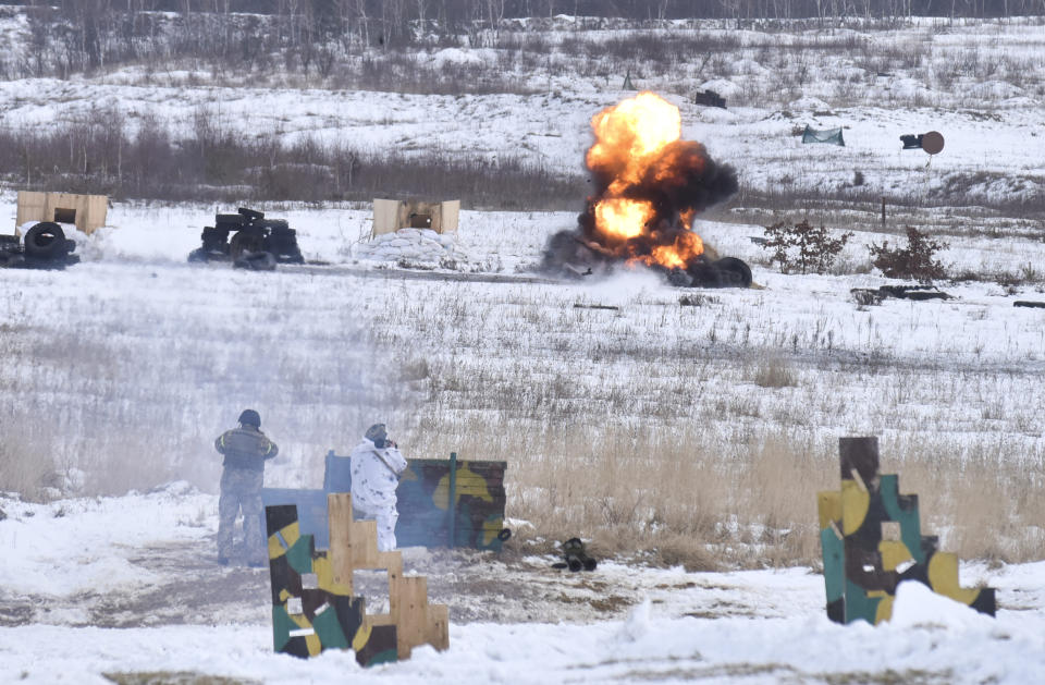 Ukrainian soldiers train for the use of US M141 Bunker Defeat Munition (SMAW-D) missiles at the Yavoriv military training ground, close to Lviv, western Ukraine, Friday, Feb. 4, 2022. The U.S. accused the Kremlin on Thursday of an elaborate plot to fabricate an attack by Ukrainian forces that Russia could use as a pretext to take military action against its neighbor. (AP Photo/Pavlo Palamarchuk)