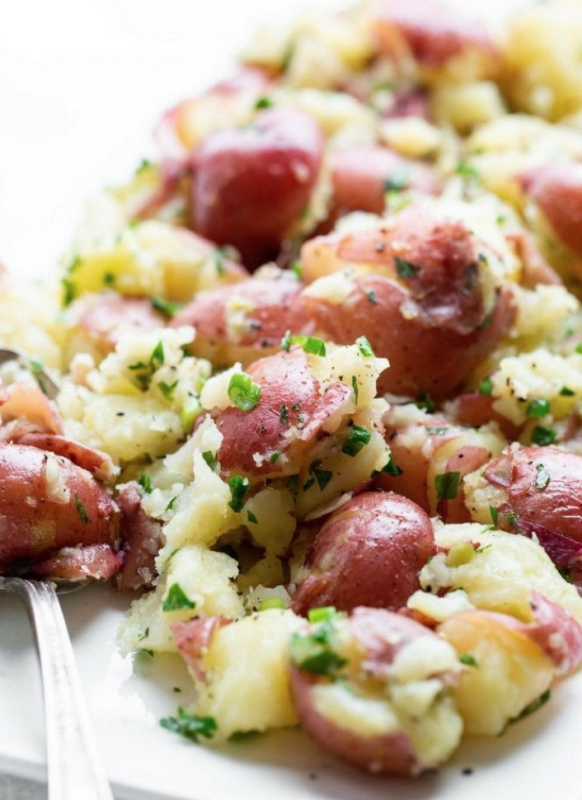 <p>Saving Dessert</p><p>Garlic and herb smashed red potatoes – an easy, inexpensive and filling side dish with plenty of flavor from the garlic, green onions and fresh parsley.</p><p><strong>Get the recipe: <a href="https://www.savingdessert.com/garlic-herb-smashed-red-potatoes/" rel="nofollow noopener" target="_blank" data-ylk="slk:Garlic Herb Smashed Red Potatoes;elm:context_link;itc:0;sec:content-canvas" class="link rapid-noclick-resp">Garlic Herb Smashed Red Potatoes</a></strong></p>