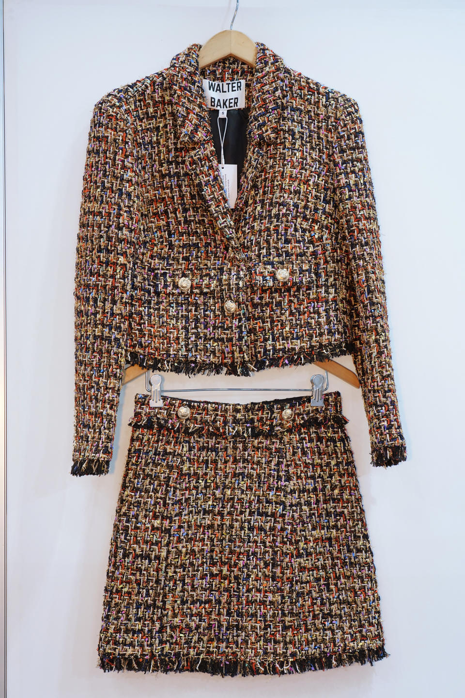 A tweed miniskirt and jacket from Walter Baker. - Credit: George Chinsee/WWD