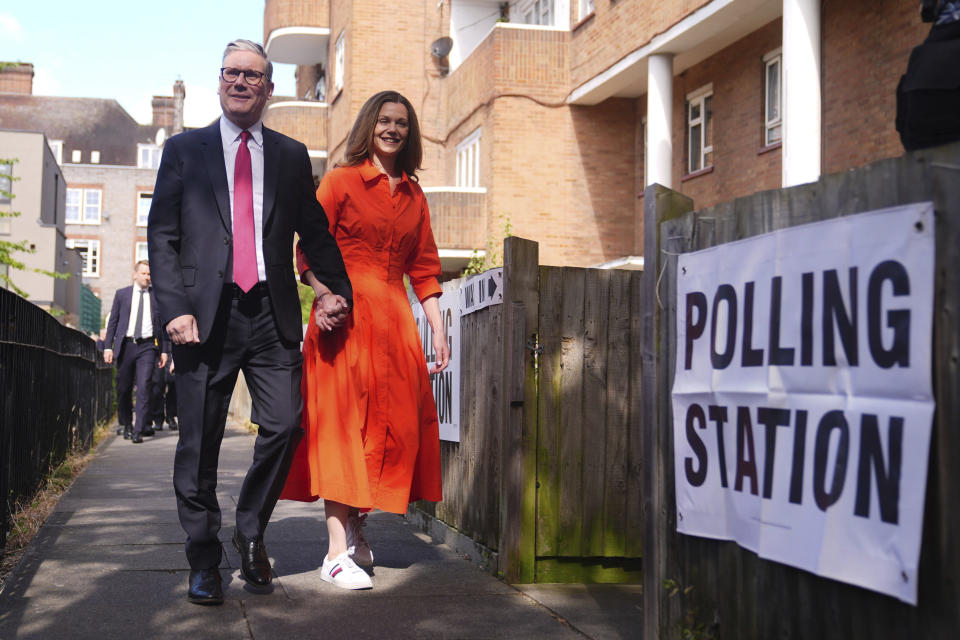 Labour leader Keir Starmer and his wife Victoria arrive to cast their votes in the 2024 General Election at Willingham Close TRA Hall in London, Thursday July 4, 2024. (James Manning/PA via AP)