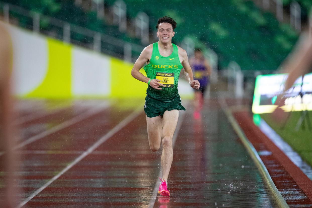 Oregon’s Devin Hart sprints toward the finish of the men’s 5,000 meters during the Oregon Twilight meet Friday, May 3, 2024, at Hayward Field in Eugene, Ore.