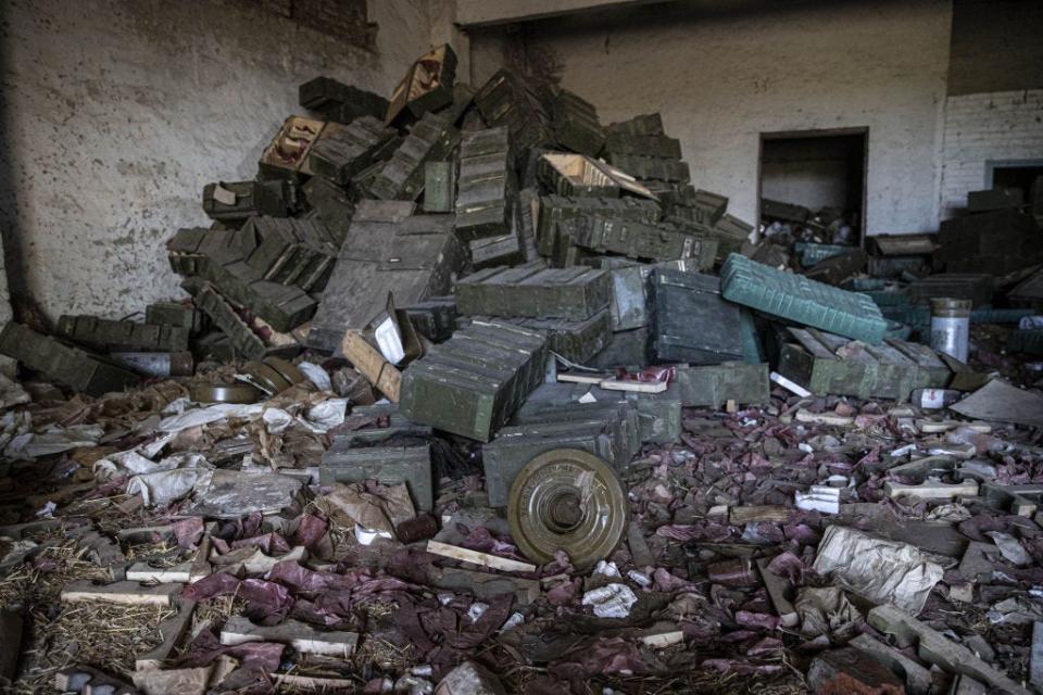 A photo shows military uniforms, lunch boxes and a large number of ammunitions belonging to the Russian forces after Russian forces withdrew at the village of Nova Gusarivka as Russia-Ukraine war continues in Balakliya, Kharkiv Oblast on Ukraine on September 21, 2022.