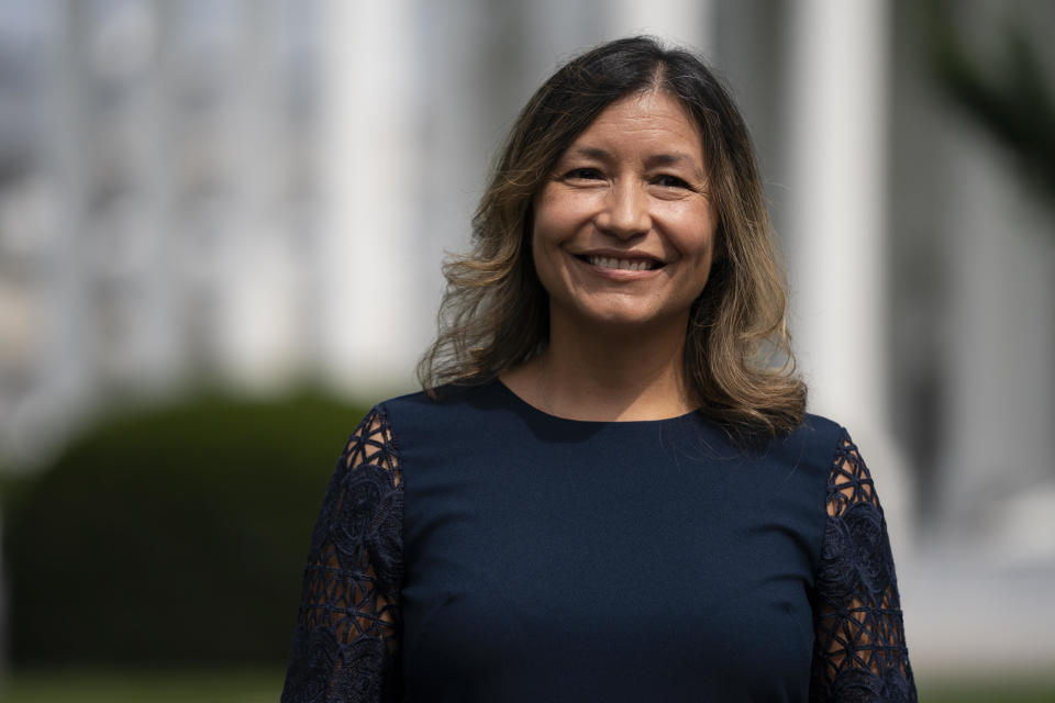 White House Intergovernmental Affairs director Julie Chavez Rodriguez stands outside the White House, Wednesday, June 9, 2021, in Washington.  / Credit: Evan Vucci / AP