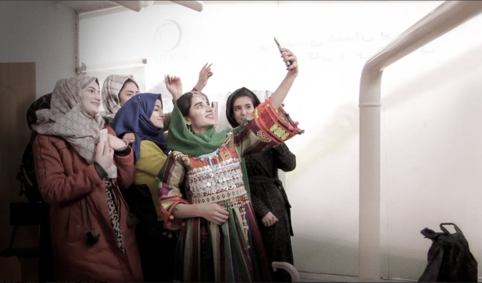 Dr. Zahra Mohammadi (in green headscarf).