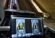 An arriving passenger to Union Station in Los Angeles is seen on the ThruVision technology that reveals suspicious objects on people during a Transportation Security Administration demonstration on Tuesday, Aug. 14, 2018. Los Angeles is poised to have the first mass transit system in the U.S. with body scanners that screen passengers for weapons and explosives. (AP Photo/Richard Vogel)