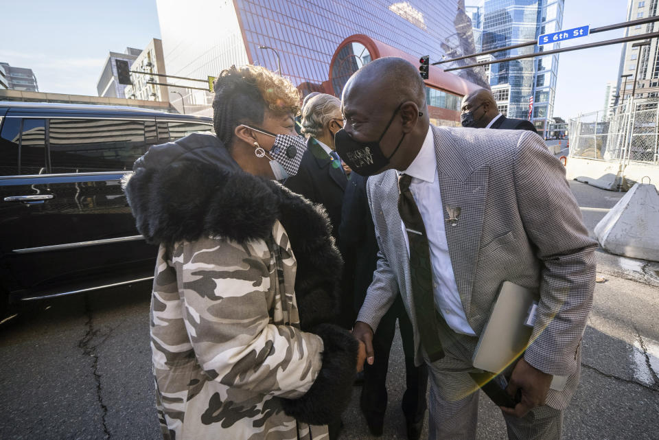 Gwen Carr, mother of Eric Garner, joins attorney Ben Crump and representatives of the Floyd family at the Hennepin County Government Center Tuesday, April 6, 2021, in Minneapolis where testimony continues in the trial of former Minneapolis police officer Derek Chauvin. Chauvin is charged with murder in the death of George Floyd during an arrest last May in Minneapolis. (Mark Vancleave/Star Tribune via AP)