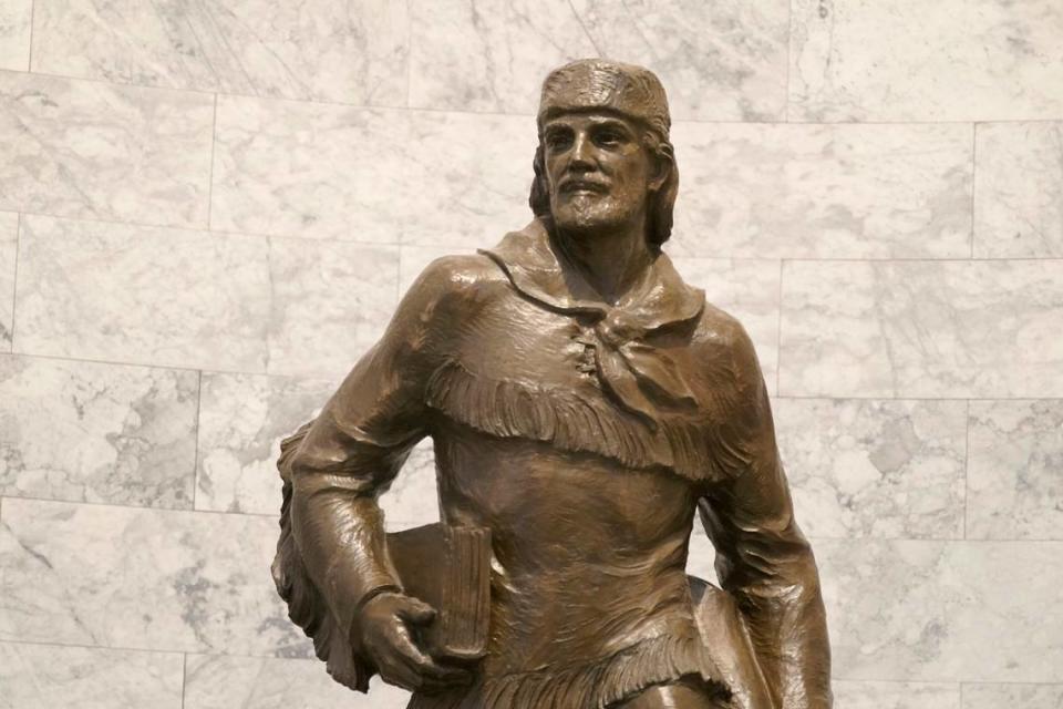 A statue of Marcus Whitman is displayed in the Legislative Building at the Capitol in Olympia, Wash., Wednesday, May 12, 2021. For generations, Whitman has been viewed as an iconic figure from early Pacific Northwest history, a venerated Protestant missionary who was among 13 people killed by the Cayuse tribe near modern-day Walla Walla, Washington, in 1847. But this past year has seen the continued reappraisal of Whitman, whose actions are now viewed by many as imperialistic and destructive, and the Washington Legislature voted to remove a similar statue of Whitman from Statuary Hall in Washington, D.C. (AP Photo/Ted S. Warren)