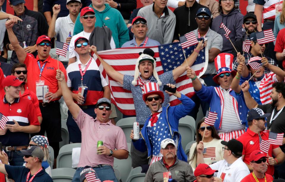 Team USA fans dance in the stands before the first tee off at the Ryder Cup at Whistling Straits, Sunday, September 26, 2021, in Haven, Wis.