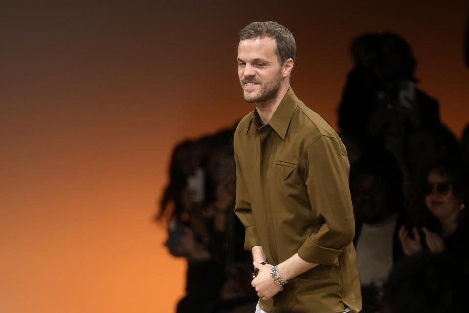Creative director Matthieu Blazy accept applause after the conclusion of the Bottega Veneta women's Fall-Winter 2024-25 collection presented in Milan, Italy, Saturday, Feb. 24, 2024. (AP Photo/Luca Bruno)