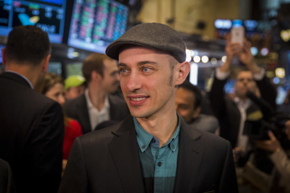 Shopify founder and Chief Executive Officer Tobi Lutke smiles after the company's IPO on the floor of the New York Stock Exchange May 21, 2015.  REUTERS/Lucas Jackson 