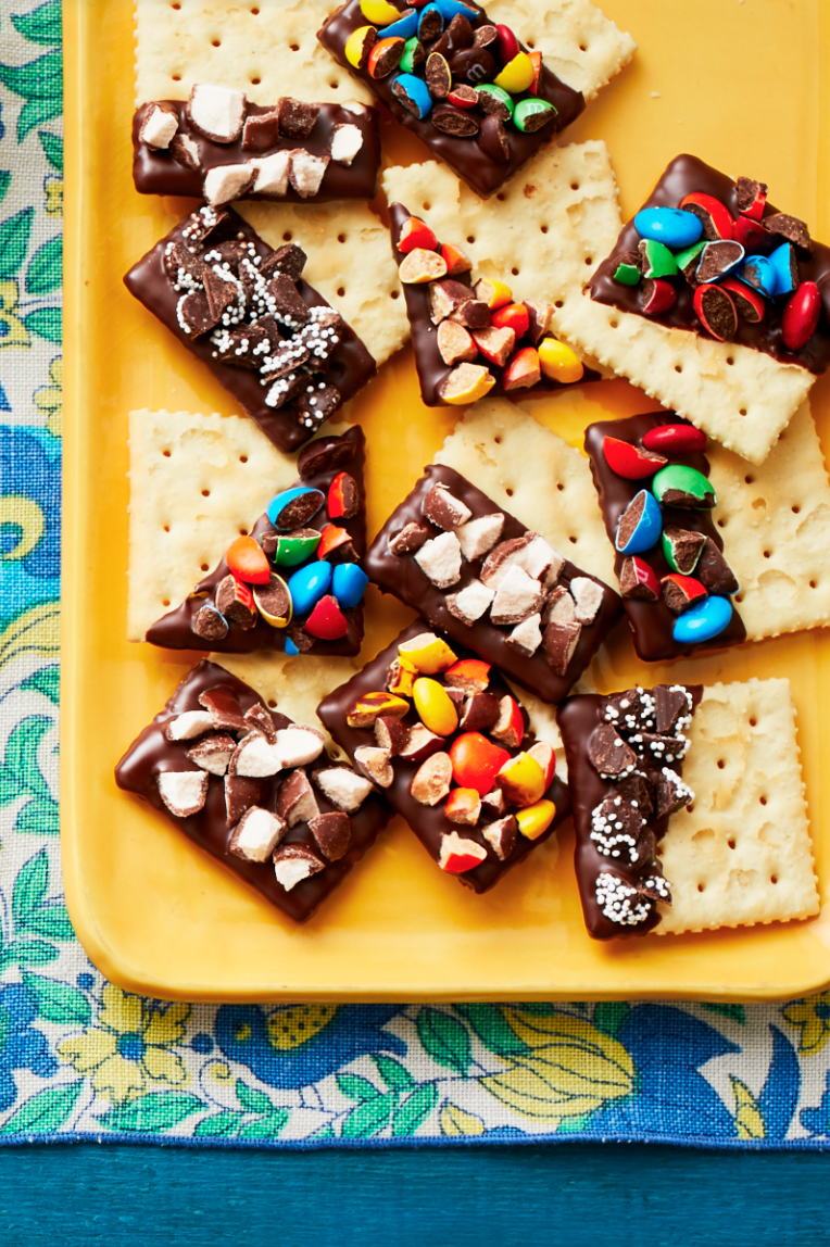 <p>If you can't decide between a sweet or savory snack, then you'll love these chocolate-dipped, candy-covered crackers. </p><p><strong><em>Get the recipe at <a href="https://www.thepioneerwoman.com/food-cooking/recipes/a32129917/concession-stand-crackers-recipe/" rel="nofollow noopener" target="_blank" data-ylk="slk:The Pioneer Woman;elm:context_link;itc:0;sec:content-canvas" class="link ">The Pioneer Woman</a>. </em></strong></p>