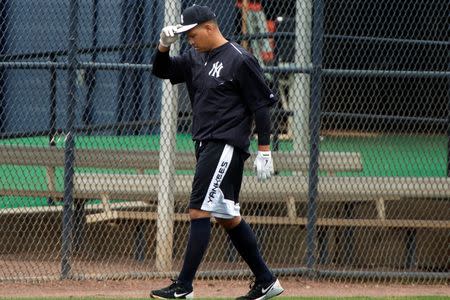New York Yankees third baseman Alex Rodriguez (13)walks across the field during afternoon workouts at New York Yankee Minor League Complex. Mandatory Credit: Tommy Gilligan-USA TODAY Sports