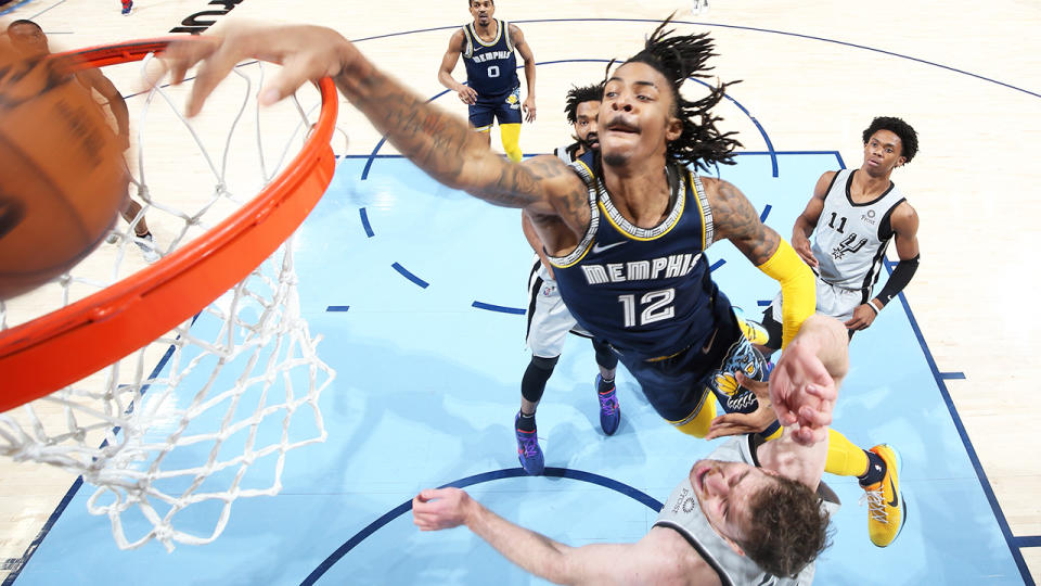 Memphis Grizzlies guard Ja Morant electrified the NBA on Tuesday when he hammered home an incredible dunk on San Antonio's Jakob Peoltl. (Photo by Joe Murphy/NBAE via Getty Images)