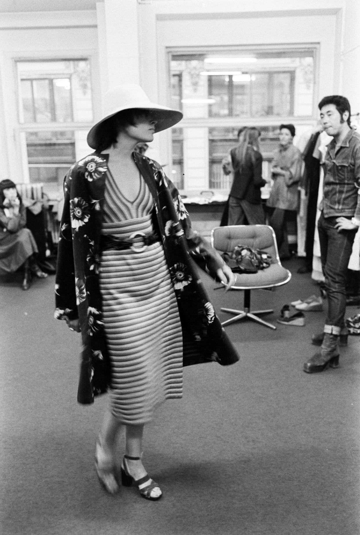 A model in a look from the spring 1975 collection in the Paris design studios of designer Issey Miyake. - Credit: WWD