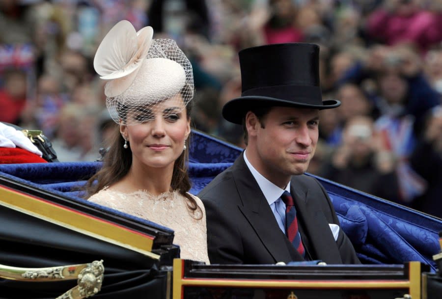 FILE – Britain’s Prince William and Kate Duchess of Cambridge pass along The Mall as part of a four-day Diamond Jubilee celebration to mark the 60th anniversary of Queen Elizabeth’s accession to the throne, London, Tuesday, June, 5, 2012. (AP Photo/Tom Hevezi, Pool, File)