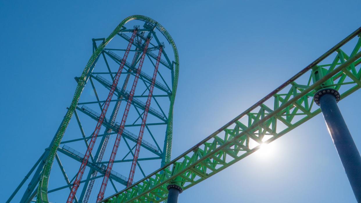 Tall green roller coaster