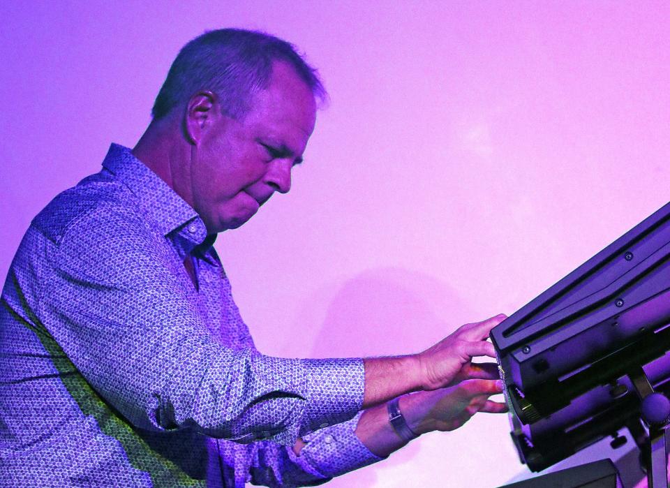Curt Taylor plays the keyboards as The Rathbones reunite for a special concert at xBk Live, 1159 24th St. in Des Moines, on Friday, Oct. 27, to celebrate their 2023 induction into the Iowa Rock ‘n Roll Hall of Fame.