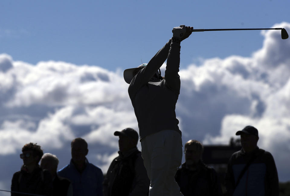 Japan's Hinako Shibuno plays her tee shot from the 12th, during the first round of the Women's British Open golf championship, in Muirfield, Scotland Thursday, Aug. 4, 2022. (AP Photo/Scott Heppell)