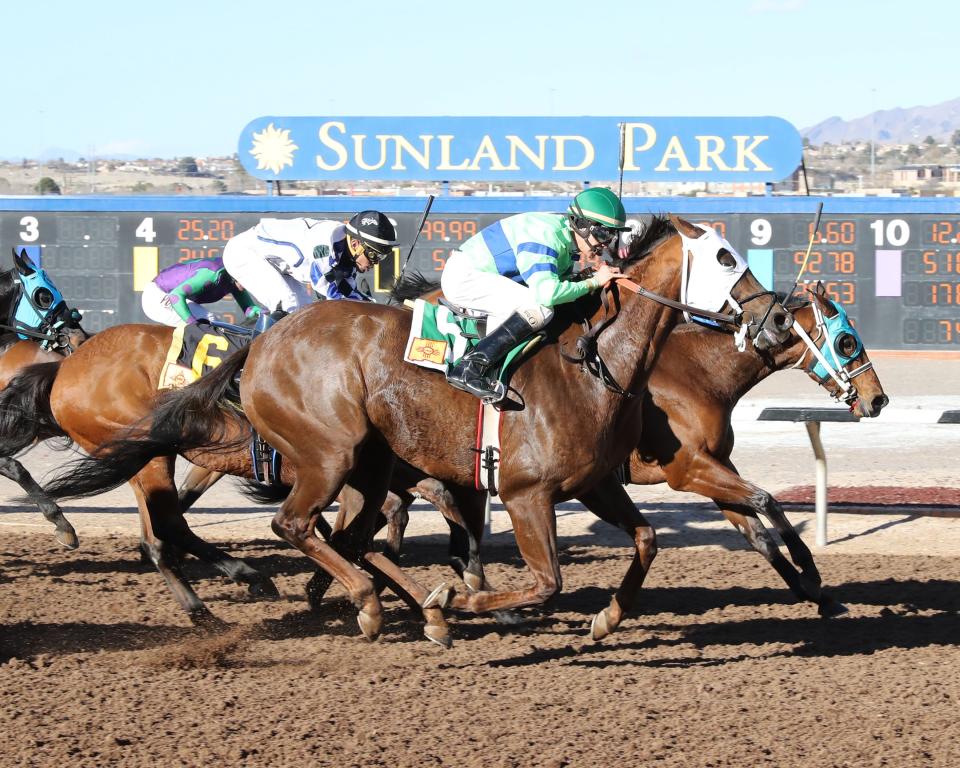 Cheese Tray (inside horse) held off Thunder Dome to win the 6 1/2 furlong Jamison Memorial Handicap Sunday at Sunland Park Racetrack & Casino.