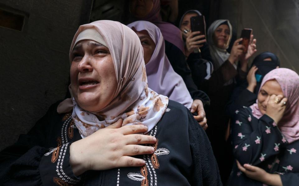 The Najm family mourns the loss of four teenagers in Jabalia, northern Gaza Strip, on 8 August, 2022. (AFP via Getty Images)