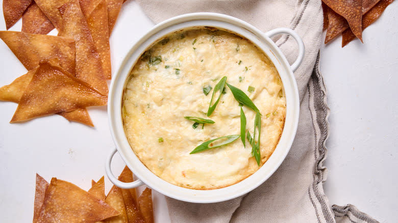 crab cheese dip with green onions and wonton chips