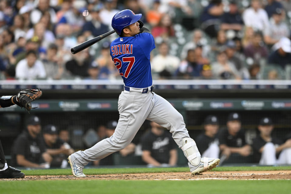 Chicago Cubs' Seiya Suzuki hits a home run off Detroit Tigers starting pitcher Alex Faedo in the fourth inning of a baseball game, Monday, Aug. 21, 2023, in Detroit. (AP Photo/Jose Juarez)